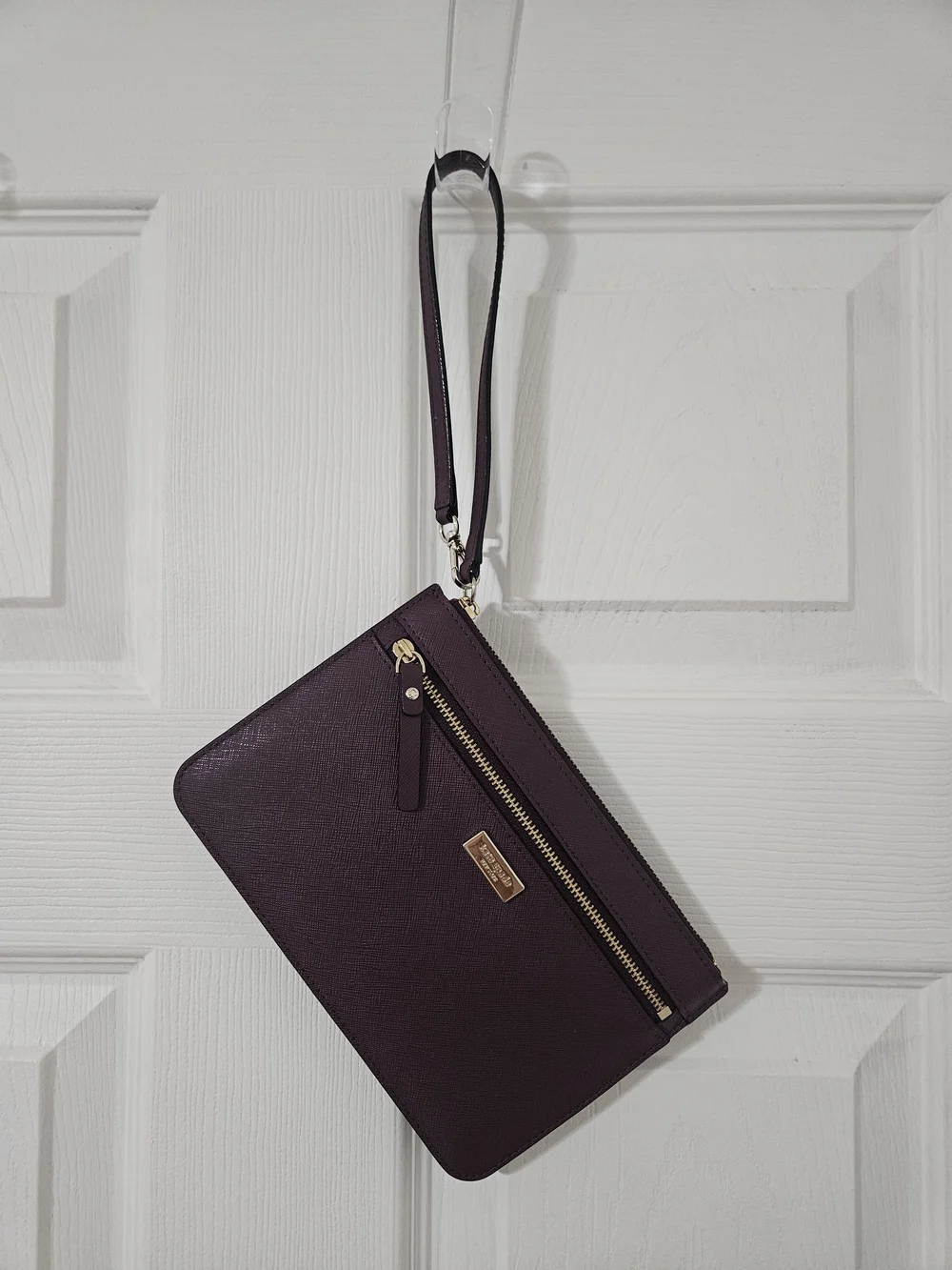 kate spade burgundy wristlet with gold hardware